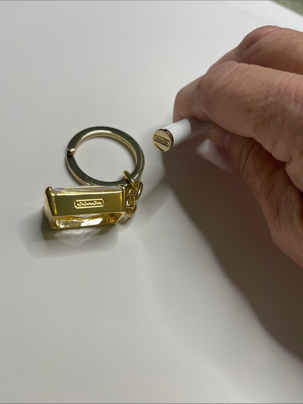 Coach Gold Rectangular Crystal Keychain with White Coach Pen - Picture 3 of 8